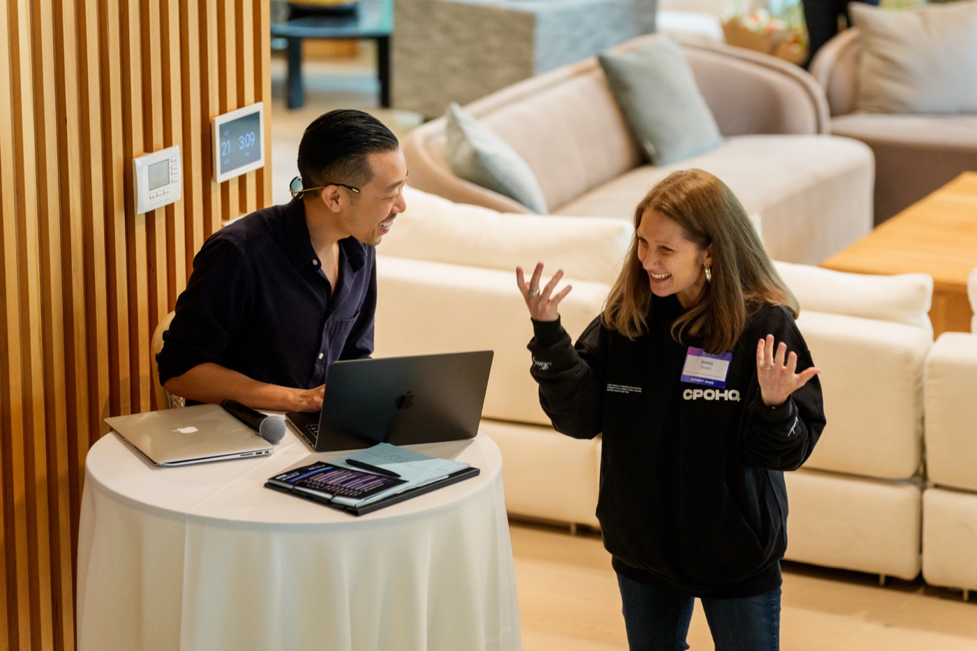 Joseph sharing a laugh with a Summit guest
