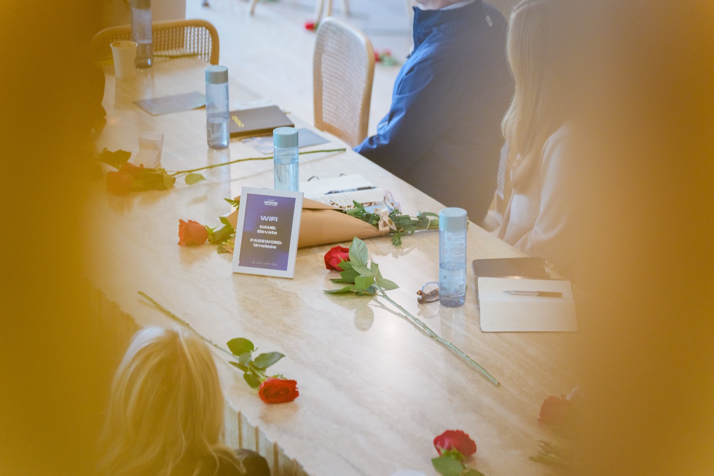 Roses and welcome details on the Summit tables