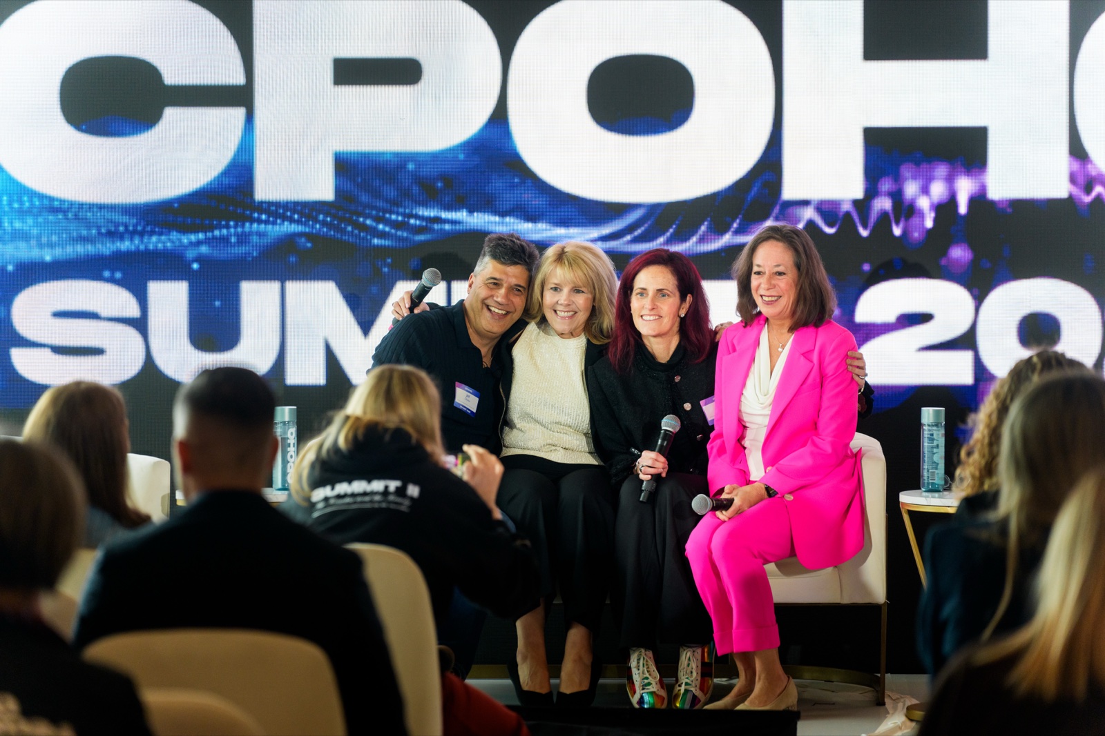 CPOHQ Summit panelists posing together on stage
